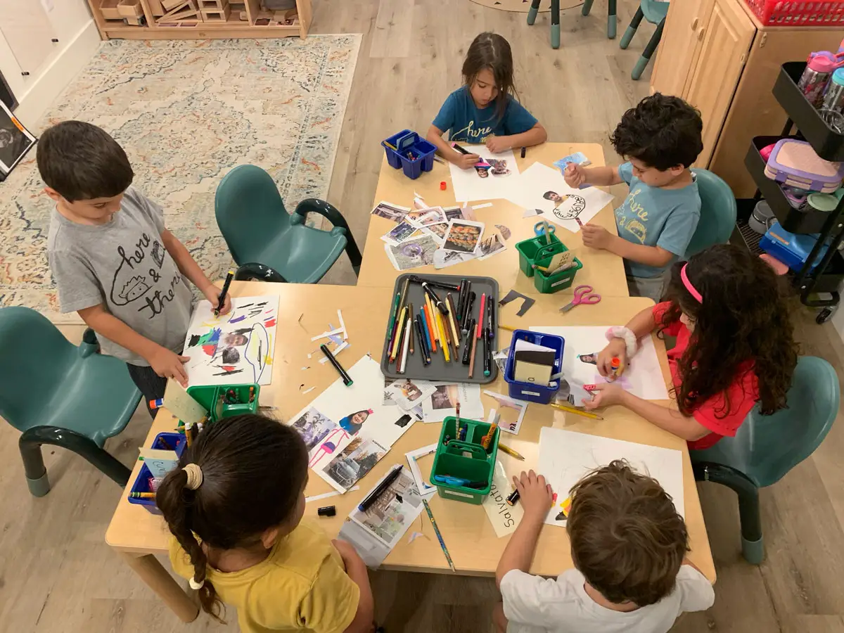 Screen-free classroom with wooden learning materials at Here & There Preschool in Aventura